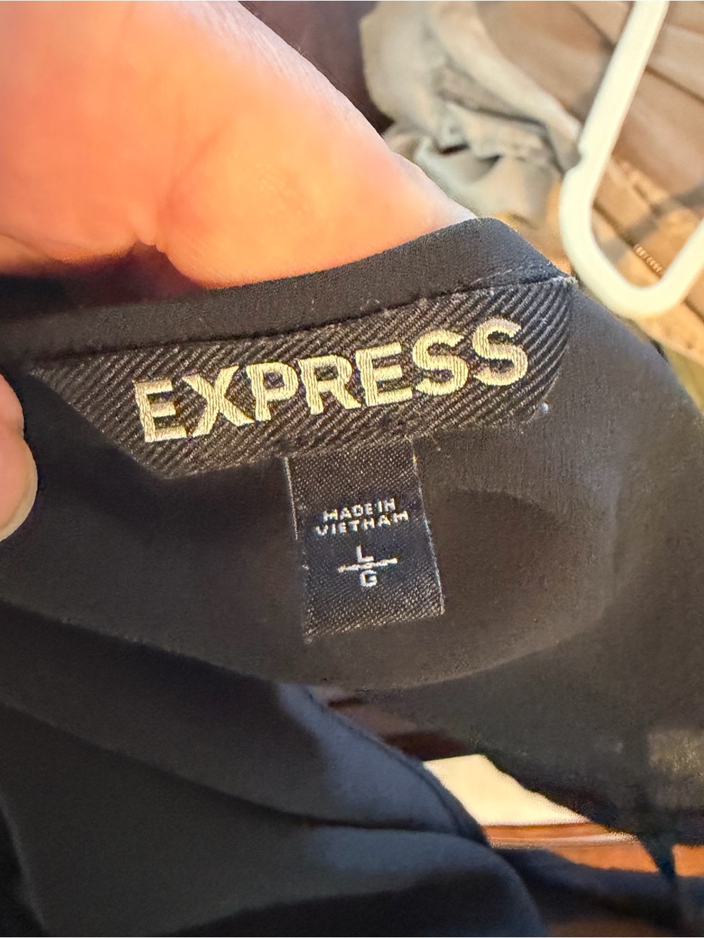 Express Black Top with Gold Logo Embroidery